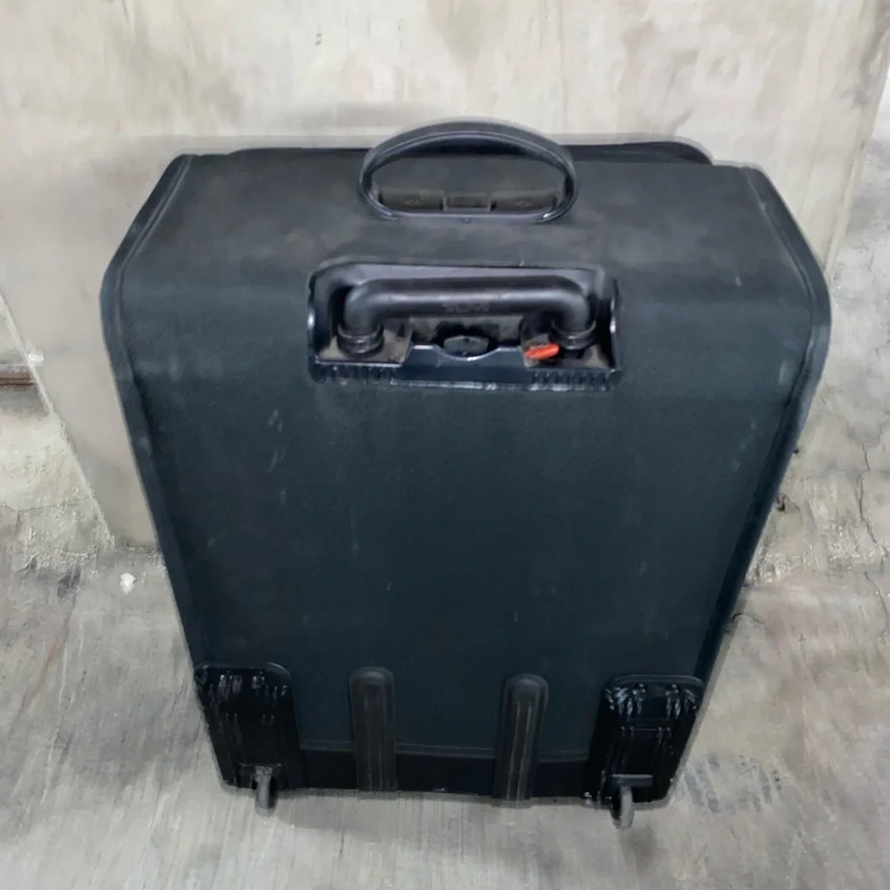 TUMI Check On Suitcase